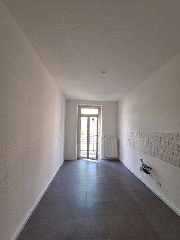 Schöne Wohnung mit Balkon! - Foto 2