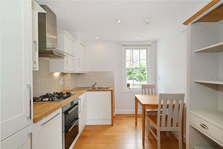 Charming two bedroom terraced house with private outdoor space - Photo 4