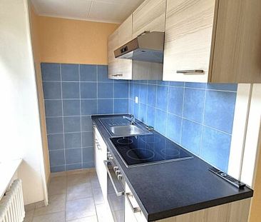 Appartement de 2.5 pièces au 1er étage dans quartier calme - Photo 1