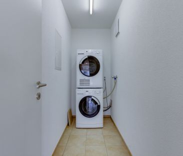 Your new spacious apartment with garden seating area! - Photo 1