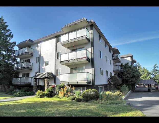 Madrona Manor Apartments | 1955 Ashgrove Street, Victoria - Photo 1