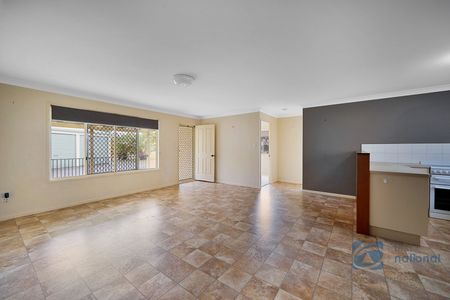 Charming Lowset Home with Private Yard and Modern Comforts - Photo 2