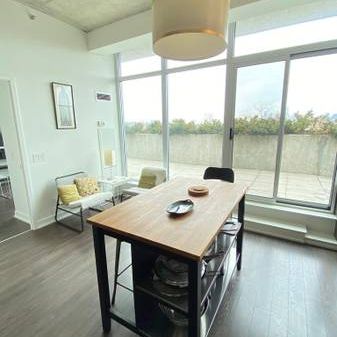 1 Bedroom Penthouse Loft with Den, Private Rooftop Patio and Parking - Photo 1