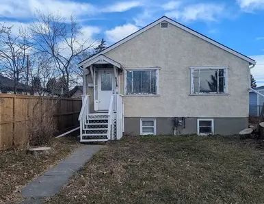 Cozy Home In Ogden | 8018 24 Street Southeast, Calgary - Photo 1