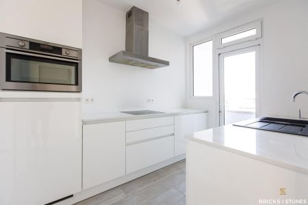 Vernieuwd appartement met terras - Foto 4
