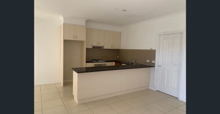 Stylish & Spacious Two-Bedroom Townhouse with Study and Garage - Photo 4