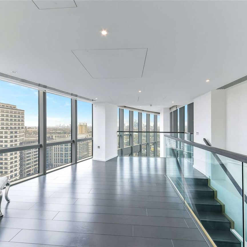 An extremely spacious two bedroom duplex apartment located on the 21st and 22nd floors of the ever popular No 1 West India Quay. - Photo 1