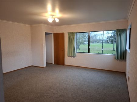 This fantastic family home offers a generous open-plan living on the ground floor, seamlessly flowing out to a rear patio and fully fenced yard—perfect for entertaining or relaxing with family. - Photo 5