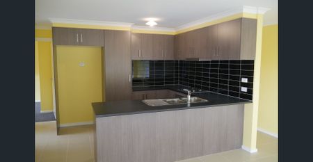 Family Home - Photo 4