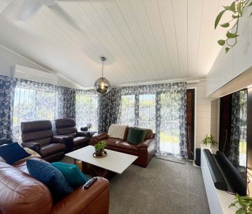 Partly Furnished 4-Bedroom Home - Photo 3