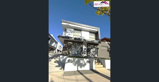 Modern Two-Bedroom Townhouse with Street Frontage and Separate Office - Photo 1