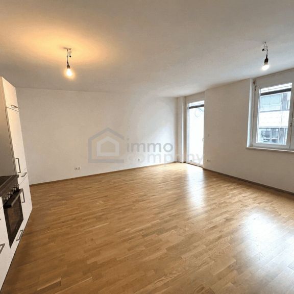Neuwertige 2-Zi Wohnung in 1100 Wien mit Balkon, Garage Stellplatz & Fußbodenheizung! - Photo 1