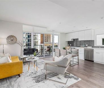 Stunning 2 bed + flex PENTHOUSE with massive rooftop patio! - Photo 6