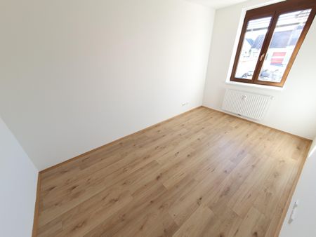 Geförderte Wohnung mit Balkon im 1. Stock - Foto 3