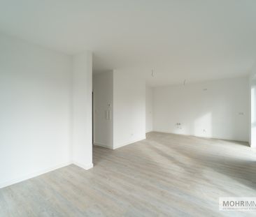 Moderne Neubauwohnung mit Süd-West Balkon zentral gelegen in Jever! - Foto 1