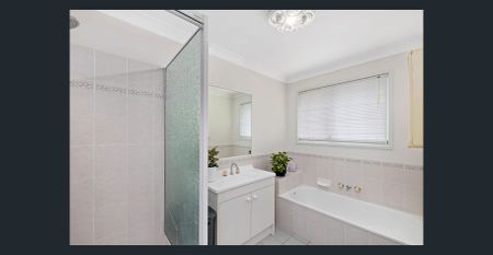 Spacious Family Home with a large shed - Photo 4