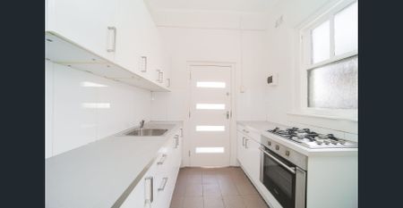 Newly Renovated 1 Bedroom in convenient location! Enter From the Rear Lane - Photo 3