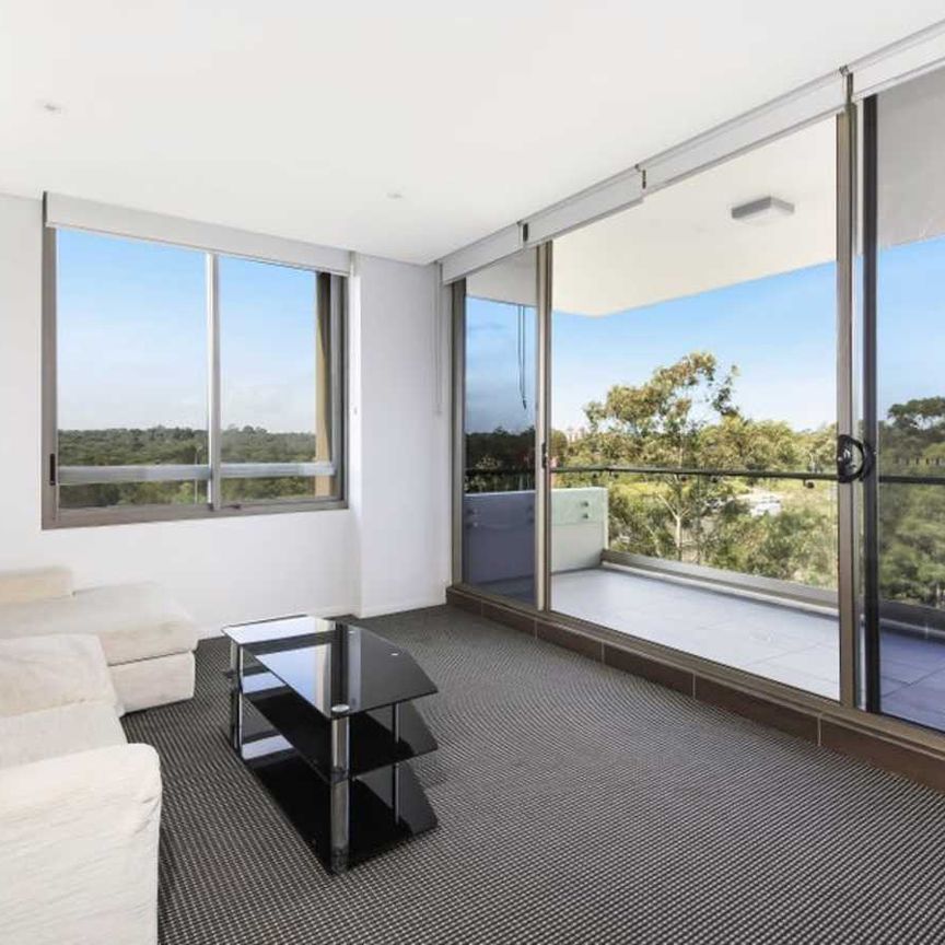 Partially Furnished I Top Floor Apartment - Photo 1