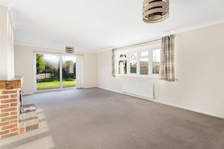 A 4-bedroom detached family home with a well proportioned rear garden and double garage. - Photo 2