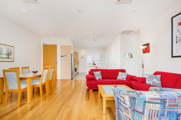 Top Floor Living in a Prime Location - Photo 1