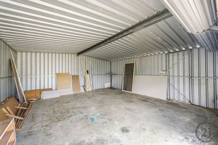 Neat & Tidy Home with Workshop and Side Access - Photo 3