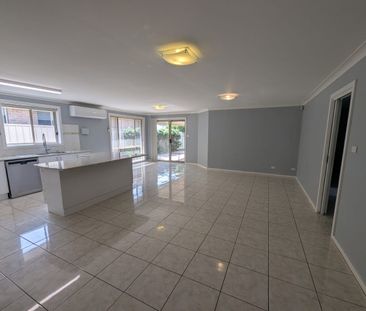 Comfortable Family Living with Entertainer's Appeal - Photo 1