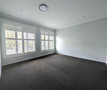 Modern 4-Bedroom Home in a Convenient Gorokan Location - Photo 3