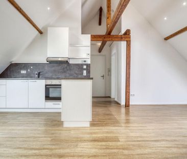 Sofort frei! DG-Wohnung im Zentrum von Gaggenau! - Photo 1