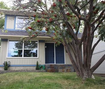 Charming Coach Hill Home | 87 Coach Manor Rise, Calgary - Photo 1