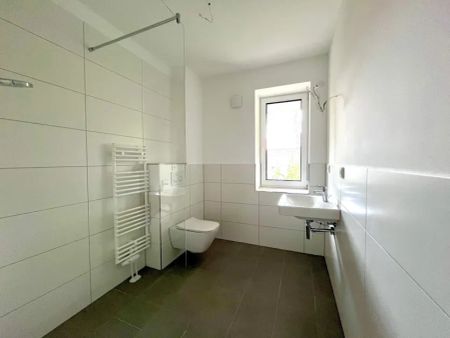 Neubau-Erstbezug! Gemütliche 2 Zi. Single-Wohnung mit eigenem Garten! - Photo 2