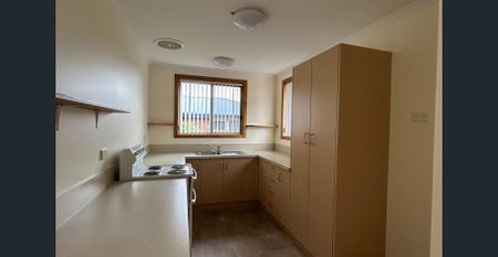 Low maintenance living - Photo 2