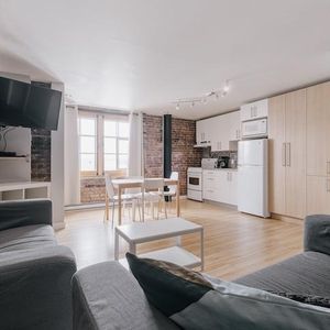Loft entièrement meublé à louer Vieux-Québec juillet 2025 - Photo 2