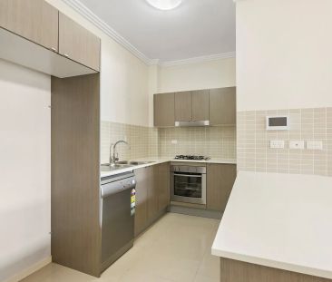 Sleek and Stylish One-Bedroom Apartment in a Prime Location - Photo 2