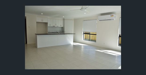 Modern 4-Bedroom Family Home in Highly Sought-After Joyner - Photo 1