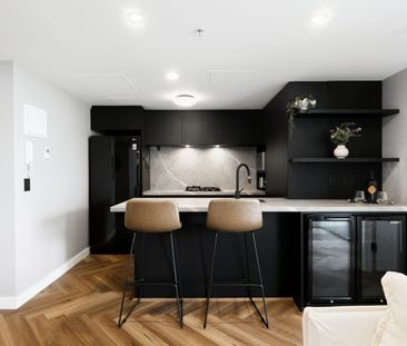 A Statement in Style | Exquisitely Renovated CBD Apartment with Spectacular Views - Photo 6