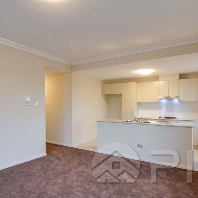 Stylish 1 bedroom Apartment with car space, walk to Norwest Metro - Photo 1