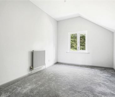 A three bedroom end terraced property situated within the Village o... - Photo 2