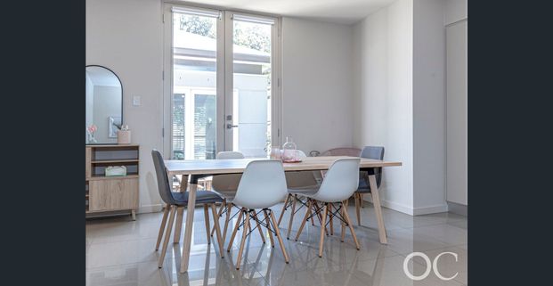 Open the Door to Spacious Family Living in Kensington's Prime Location - Photo 1