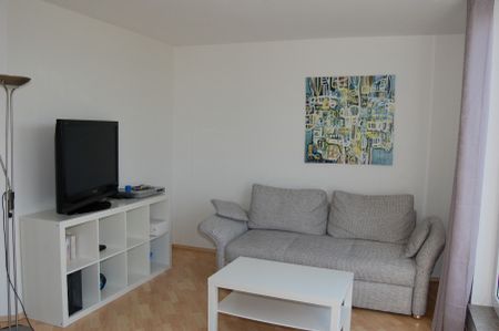 Moderne und helle 2-Zimmerwohnung mit Dachterrasse in schöner Wohnlage! - Foto 2