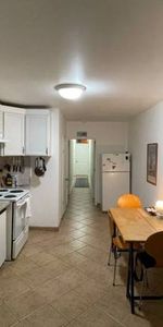 Queen and Gladstone -- 2 bed - Photo 3