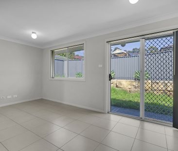 Cozy and Well-Maintained 2-Bedroom Home - Photo 1