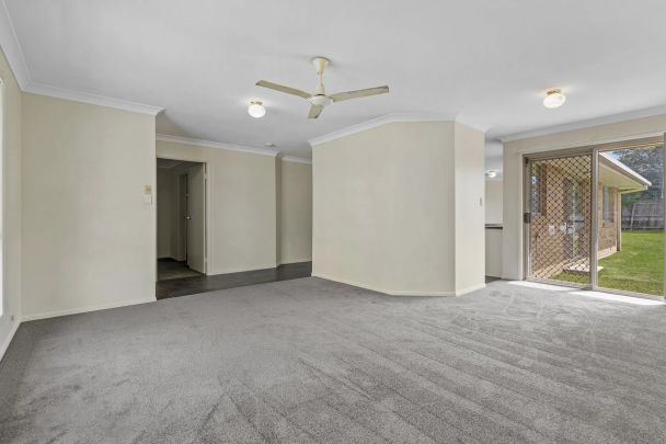 Four bedroom home with air conditioning on large block.. - Photo 1