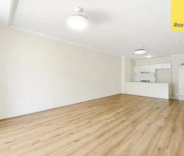 Modern & Fresh: Renovated 2-Bed Unit with Brand New Floating Floors - Photo 2