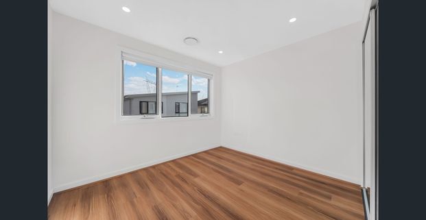 Brand New Luxury Townhouse with Designer Finishes & Modern Comfort - Photo 1