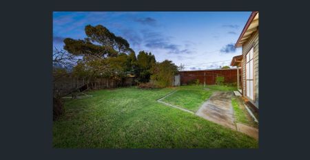 Comfortable 3-Bedroom Home in a Convenient Location - Photo 5