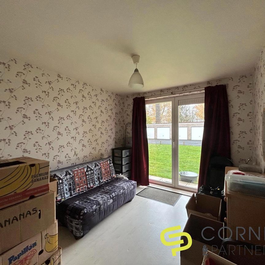 Gelijkvloers appartement met twee slaapkamers en garagebox - Foto 1