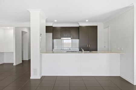 Modern Family Home with Multiple Living Areas in Convenient Bellbird Park Location - Photo 4