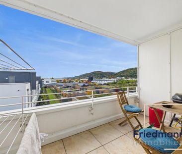 Stilvolle 2-Zimmer-Wohnung mit Weitblick über das Bobinet-Quartier - Photo 1
