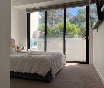 1 bedroom unit with a fridge & a washing machine/dryer - Photo 6