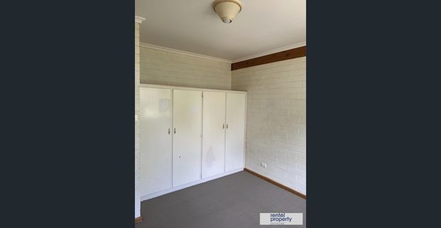 TIDY 2 BEDROOM UPSTAIRS UNIT - Photo 1